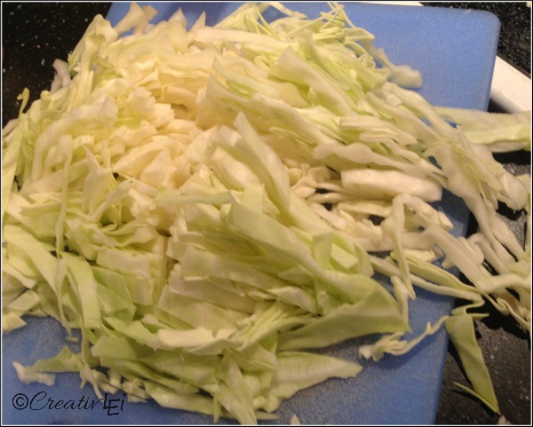 Thinly sliced cabbage help stretch a dollar for egg roll in a bowl. CreativLEI.com